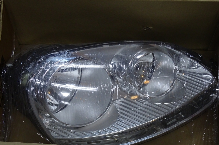 Koplamp Golf 5 rechts